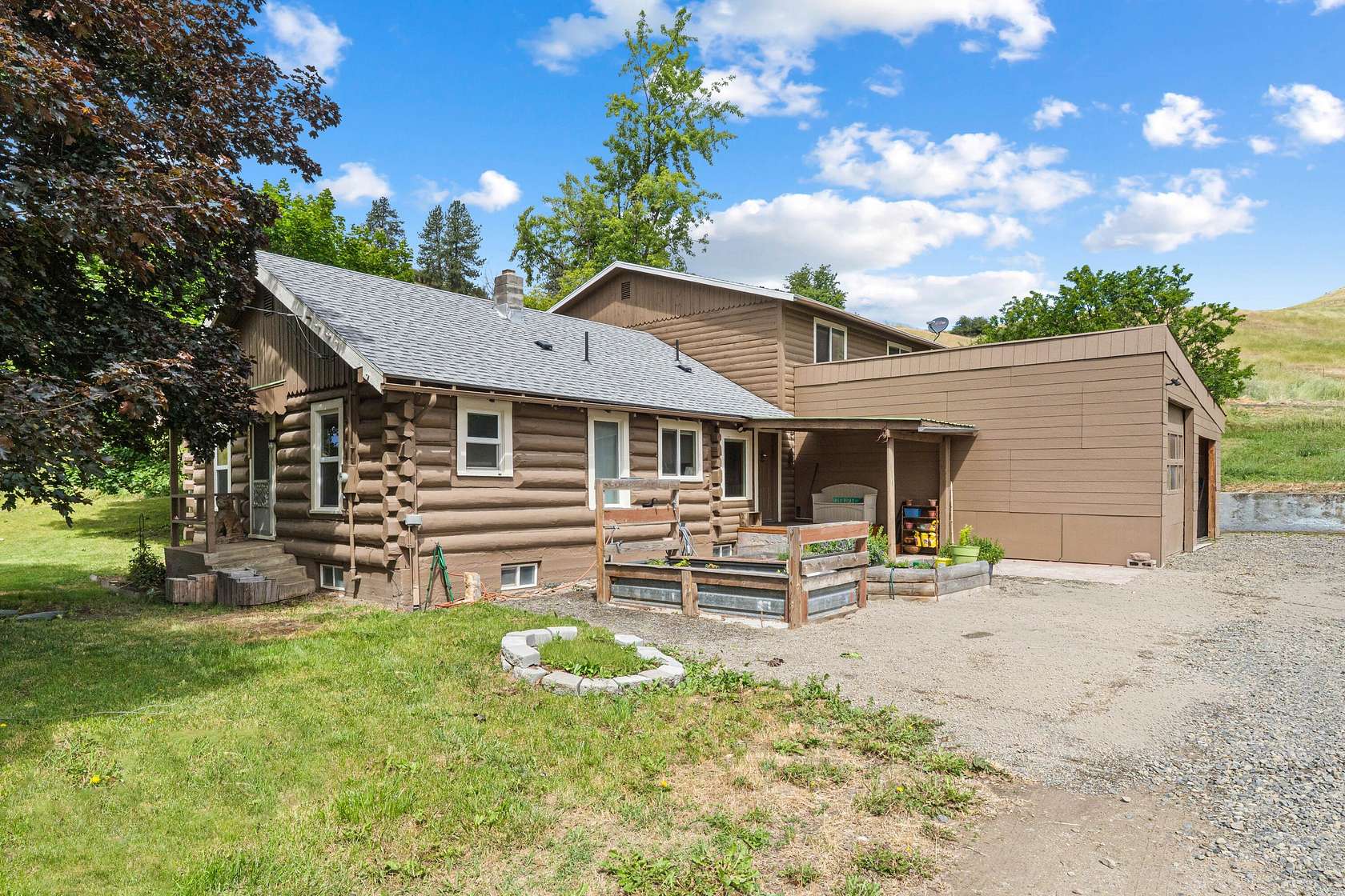 35.2 Acres of Land with Home for Sale in Hunters, Washington