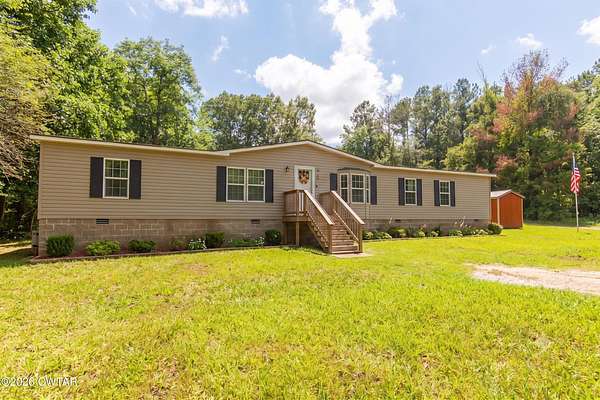 3.5 Acres of Land with Home for Sale in Jackson, Tennessee