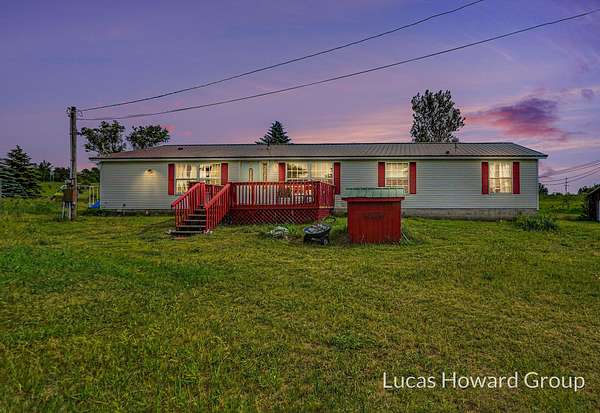 2.73 Acres of Land with Home for Sale in Chase, Michigan