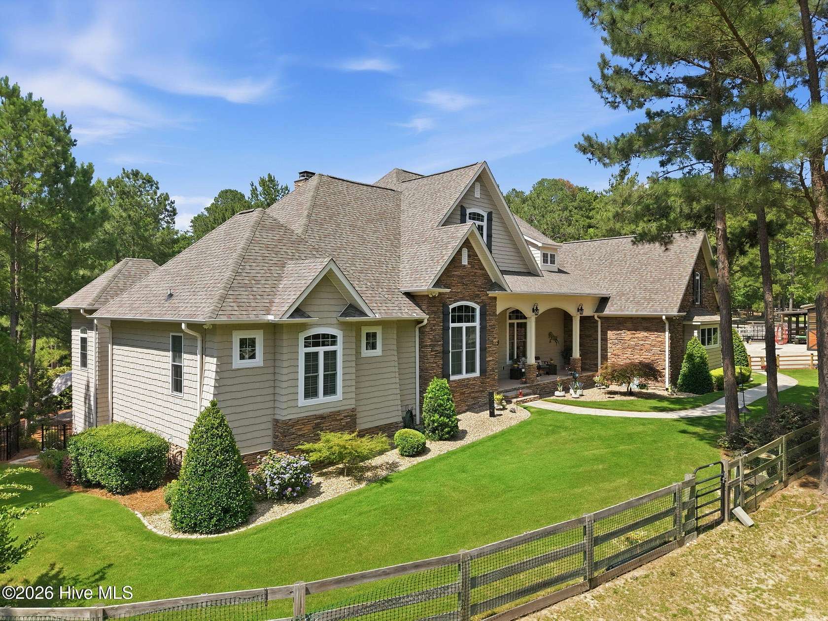 7.12 Acres of Land with Home for Sale in West End, North Carolina