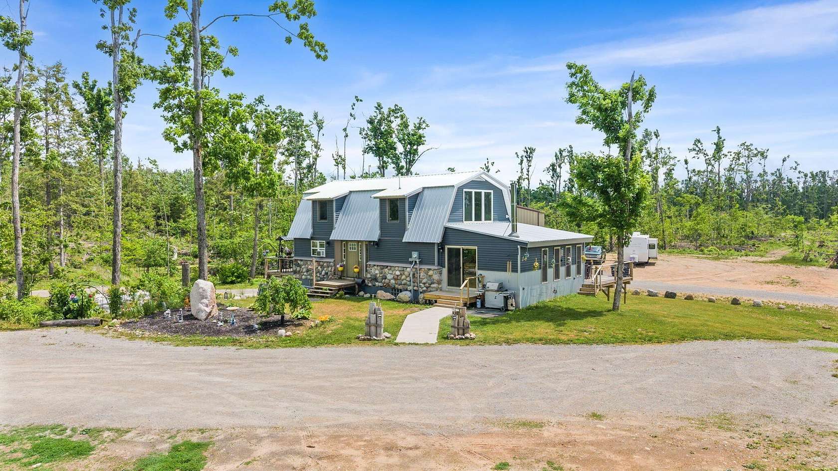 19 Acres of Recreational Land with Home for Sale in Lewiston, Michigan