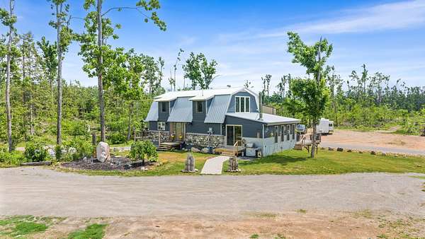 19 Acres of Recreational Land with Home for Sale in Lewiston, Michigan