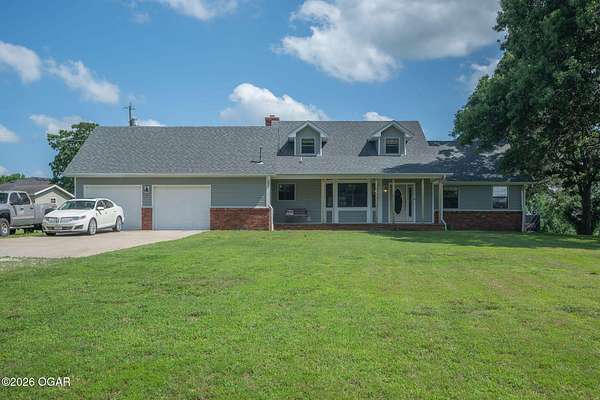 27.2 Acres of Recreational Land with Home for Sale in Carl Junction, Missouri