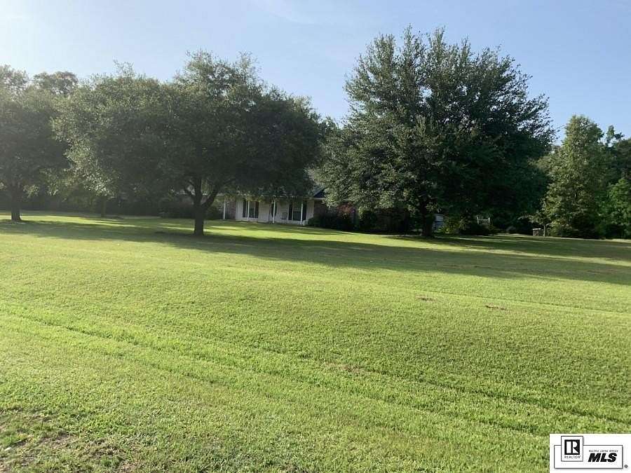3.63 Acres of Land with Home for Sale in Bastrop, Louisiana
