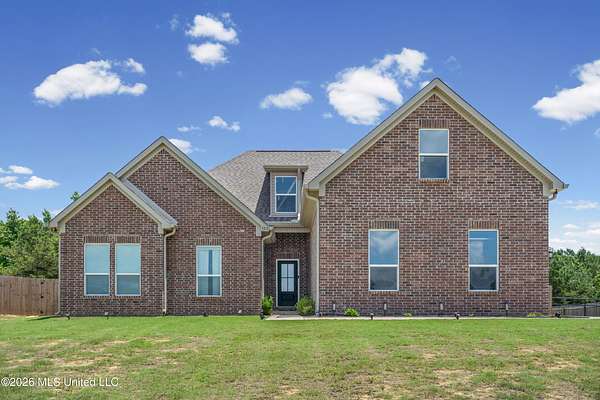 1.5 Acres of Land with Home for Sale in Coldwater, Mississippi