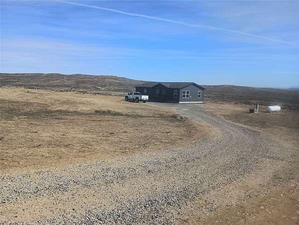21.2 Acres of Recreational Land with Home for Sale in Belfry, Montana