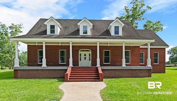 6.84 Acres of Land with Home for Sale in Atmore, Alabama