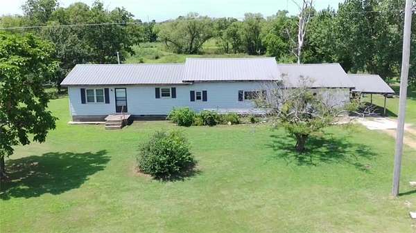 5 Acres of Land with Home for Sale in Okemah, Oklahoma