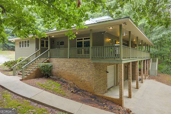 9.77 Acres of Land with Home for Sale in Bowersville, Georgia