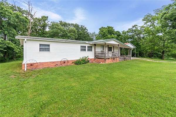 42 Acres of Recreational Land with Home for Sale in Lawson, Missouri