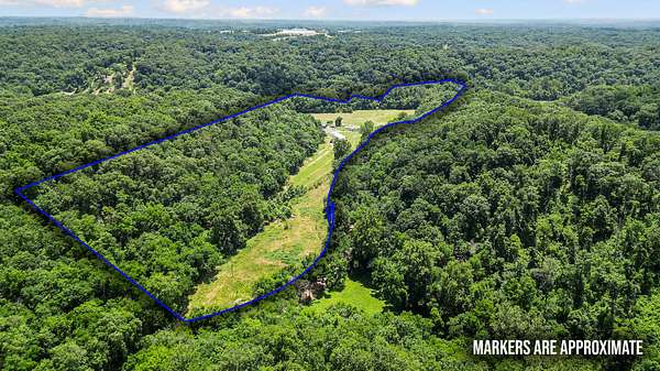28.3 Acres of Land with Home for Sale in Pineville, Missouri