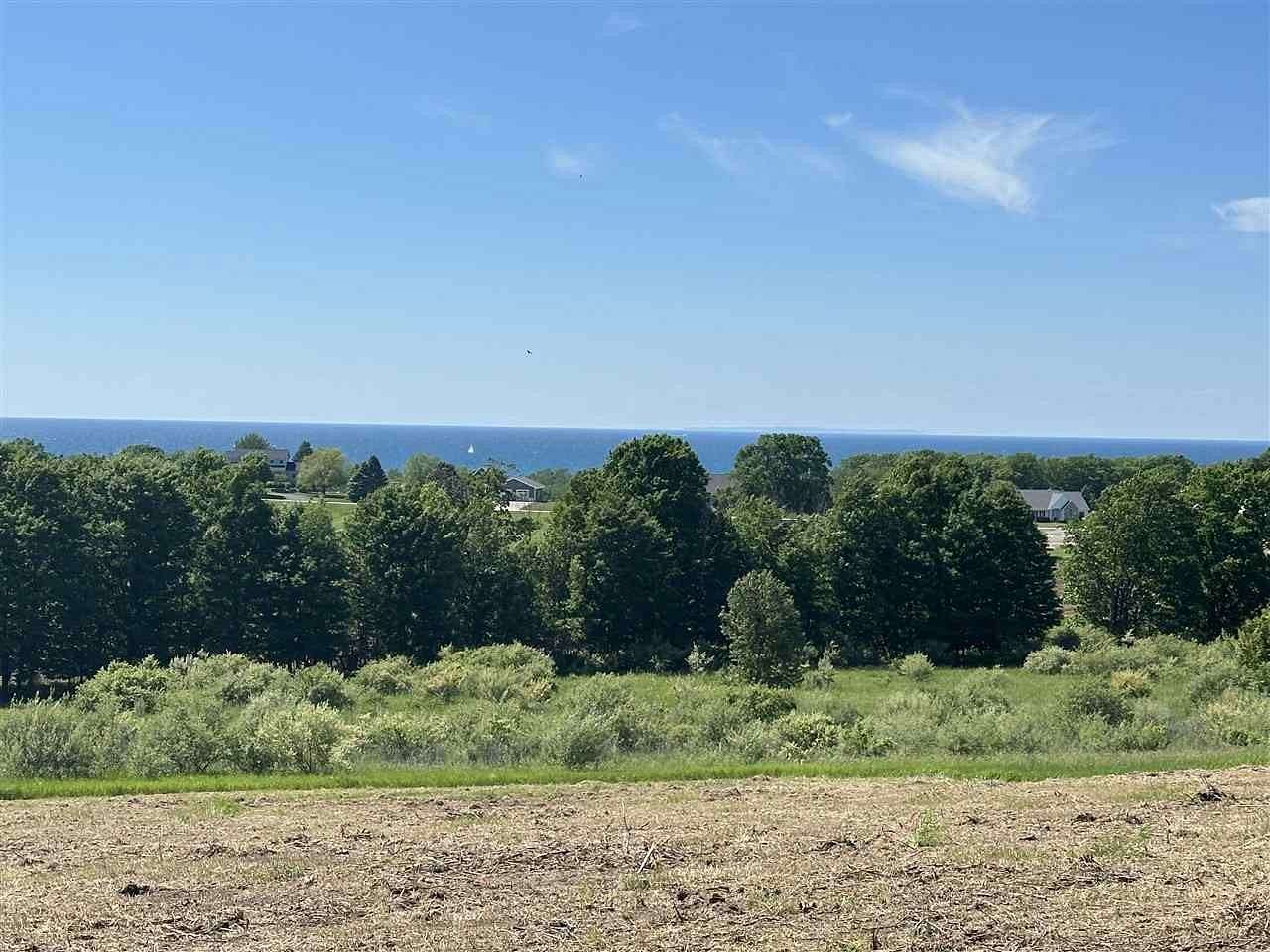 0.98 Acres of Residential Land for Sale in Charlevoix, Michigan
