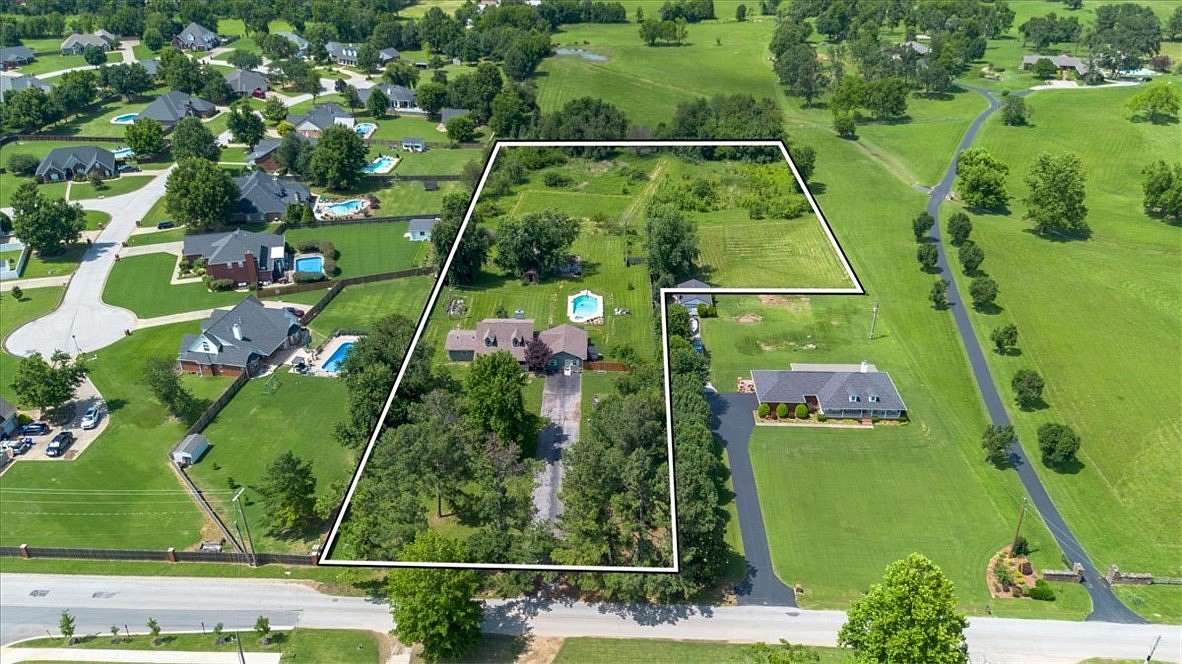 4.74 Acres of Land with Home for Sale in Rogers, Arkansas