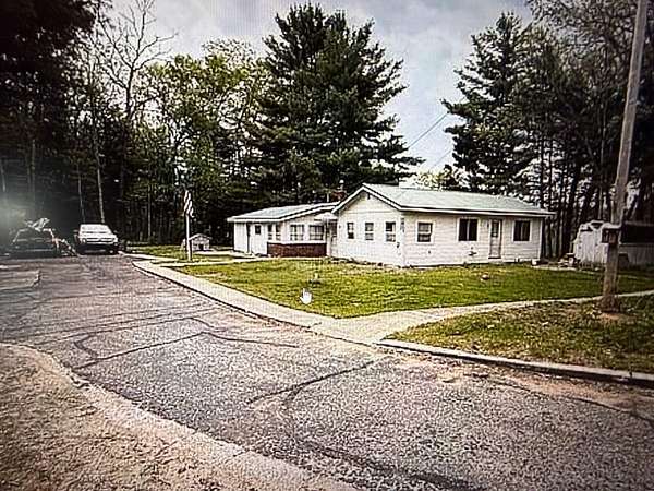 10 Acres of Recreational Land with Home for Sale in White Cloud, Michigan