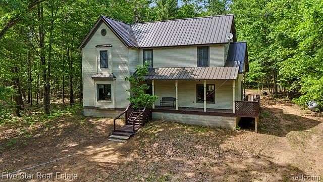 10 Acres of Recreational Land with Home for Sale in Clayton Township, Michigan