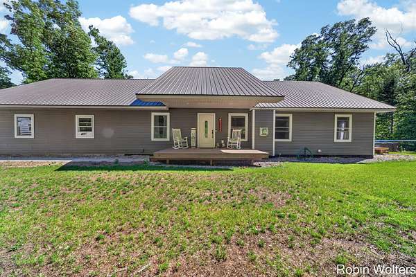 8.78 Acres of Land with Home for Sale in Holton, Michigan