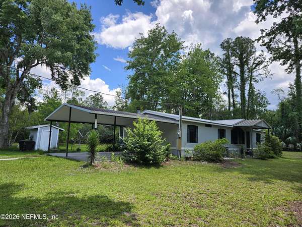 2.55 Acres of Land with Home for Sale in San Mateo, Florida