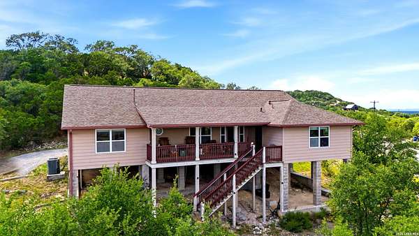 1.56 Acres of Land with Home for Sale in Lakehills, Texas