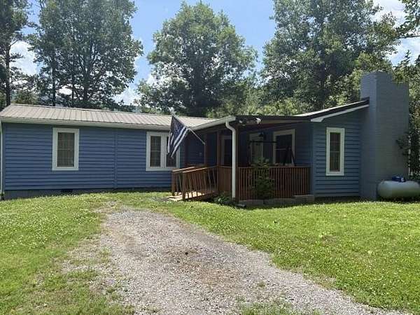 13.5 Acres of Land with Home for Sale in Benton, Tennessee