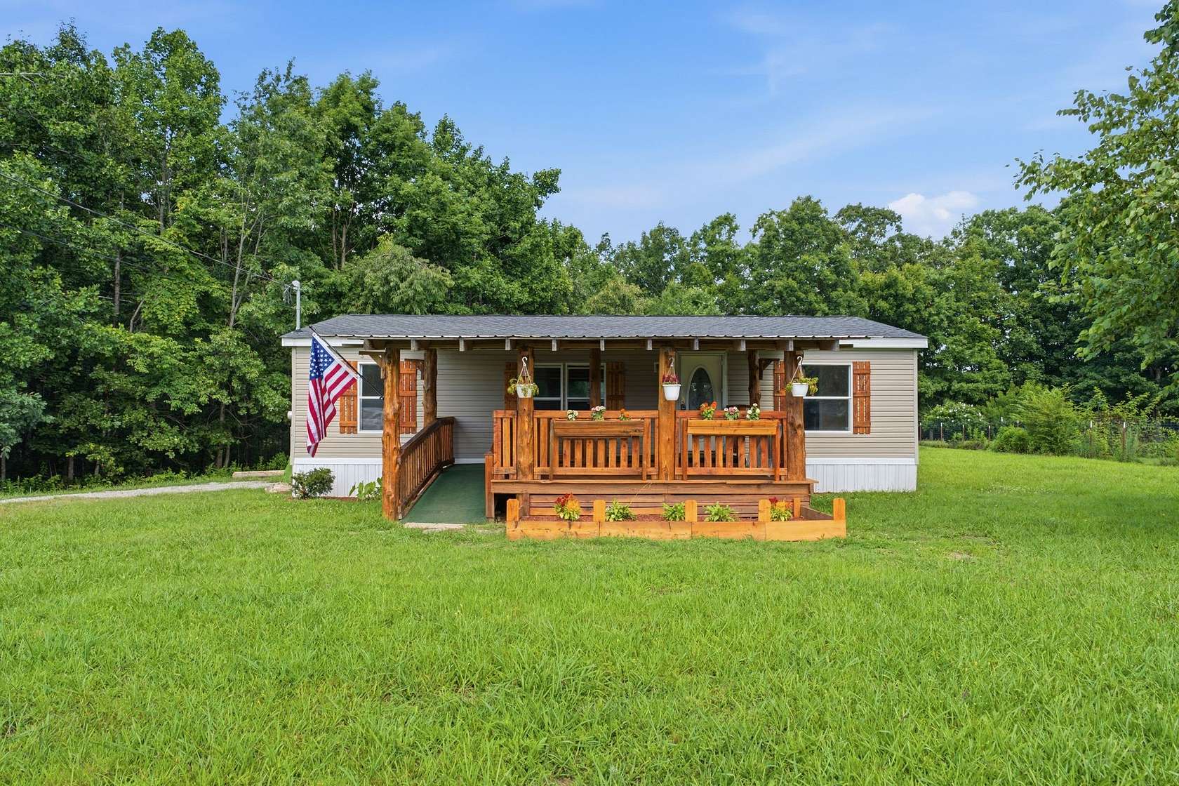 1.56 Acres of Land with Home for Sale in Hohenwald, Tennessee