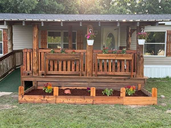 1.56 Acres of Land with Home for Sale in Hohenwald, Tennessee