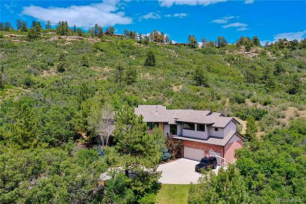 2.3 Acres of Land with Home for Sale in Castle Rock, Colorado