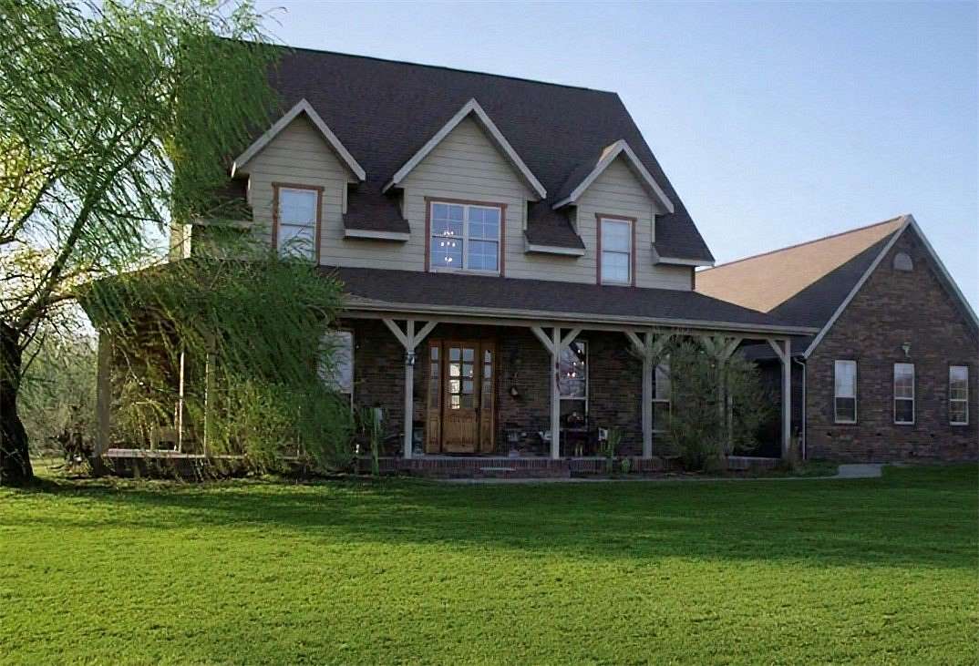 34.4 Acres of Land with Home for Sale in Gentry, Arkansas