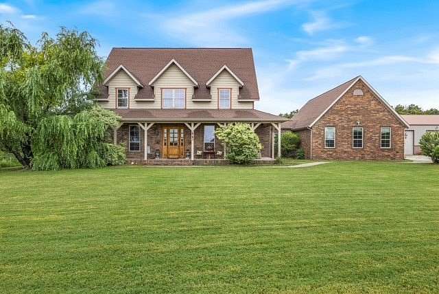34.4 Acres of Land with Home for Sale in Gentry, Arkansas