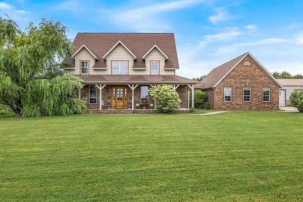 34.4 Acres of Land with Home for Sale in Gentry, Arkansas