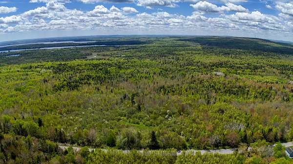 107 Acres of Recreational & Residential Land for Sale in Cooper, Maine