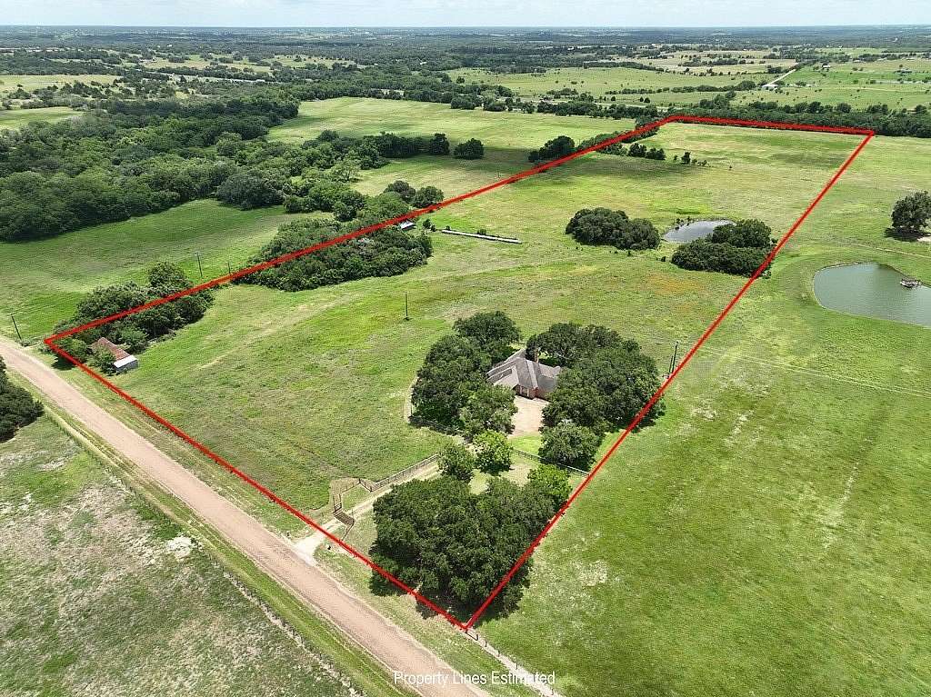 33.8 Acres of Agricultural Land with Home for Sale in Schulenburg, Texas