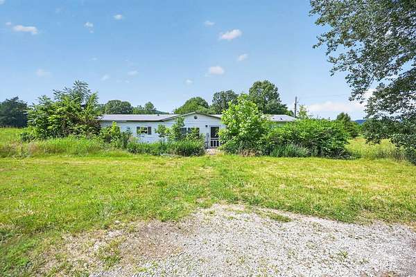 8.5 Acres of Land with Home for Sale in Gordonsville, Tennessee