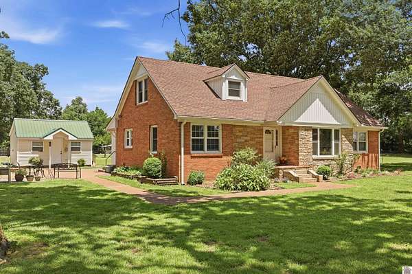 7 Acres of Land with Home for Sale in Murray, Kentucky