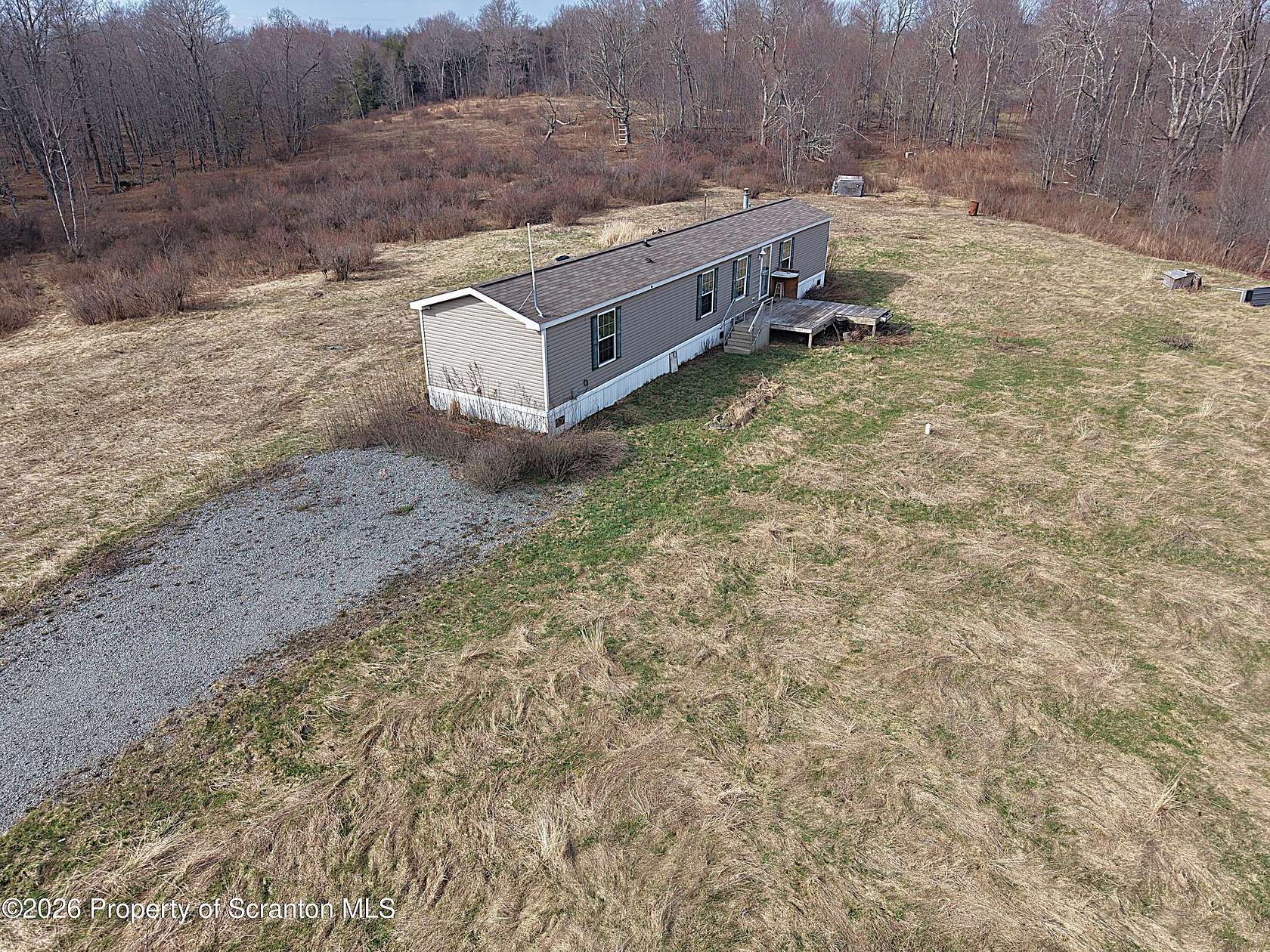 8.1 Acres of Land with Home for Sale in Thompson, Pennsylvania