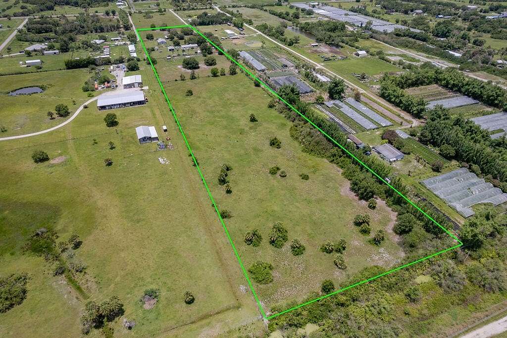 14.7 Acres of Land with Home for Sale in Indiantown, Florida