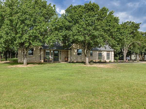30.3 Acres of Land with Home for Sale in Alvord, Texas