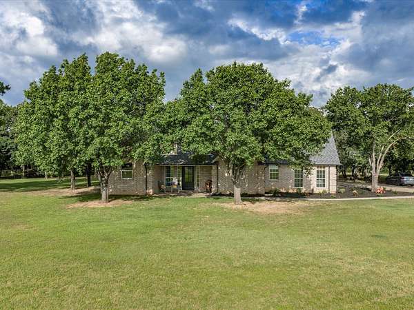 30.3 Acres of Land with Home for Sale in Alvord, Texas