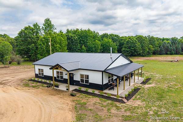 18 Acres of Land with Home for Sale in Greenville, Michigan