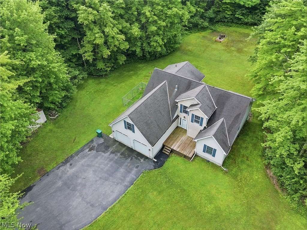 6 Acres of Land with Home for Sale in Geneva, Ohio