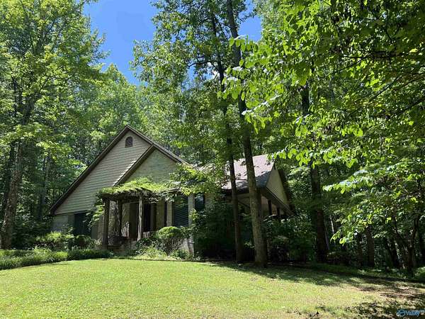 14.2 Acres of Land with Home for Sale in Athens, Alabama