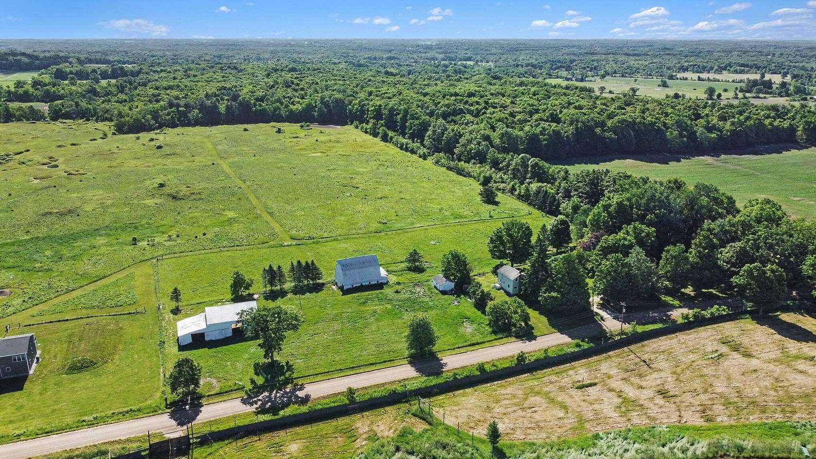 5 Acres of Land with Home for Sale in Bellevue, Michigan