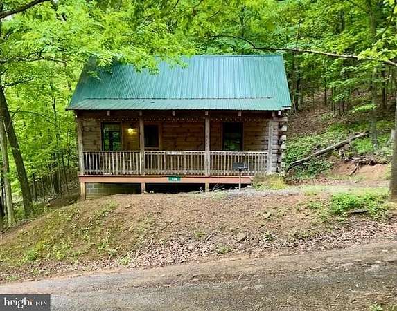 14 Acres of Recreational Land with Home for Sale in Cabins, West Virginia