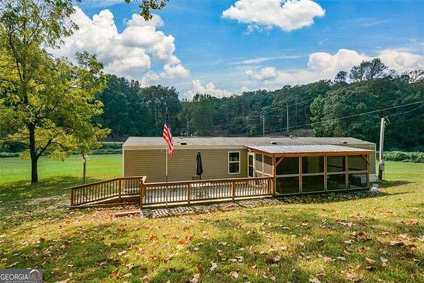 7.79 Acres of Land with Home for Sale in Jasper, Georgia