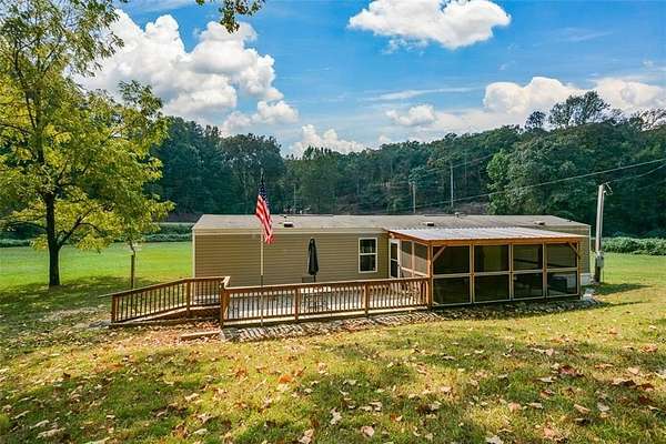 7.79 Acres of Land with Home for Sale in Jasper, Georgia