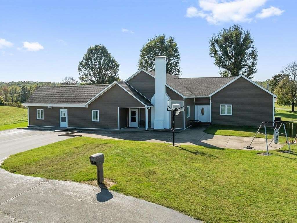 17.7 Acres of Land with Home for Sale in Earlington, Kentucky