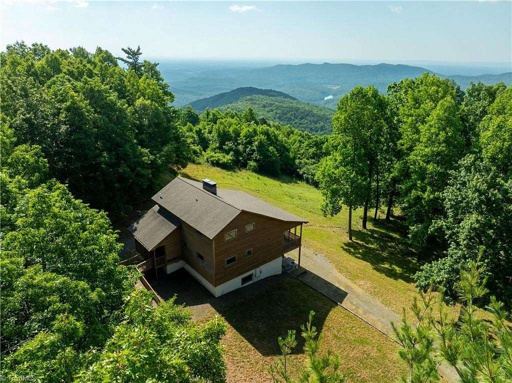 2.86 Acres of Land with Home for Sale in Glade Valley, North Carolina