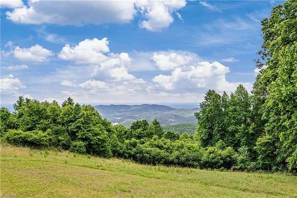 2.86 Acres of Land with Home for Sale in Glade Valley, North Carolina
