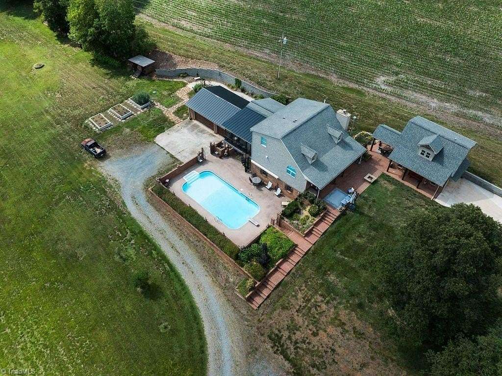 4 Acres of Land with Home for Sale in East Bend, North Carolina