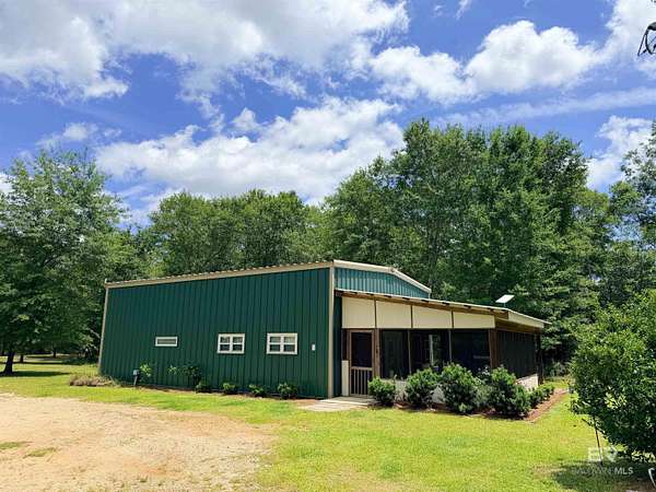 5 Acres of Land with Home for Sale in Elberta, Alabama
