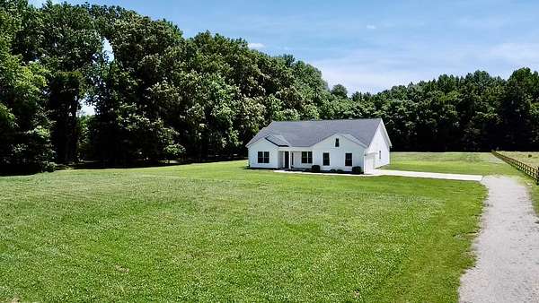 7.6 Acres of Land with Home for Sale in Ardmore, Tennessee